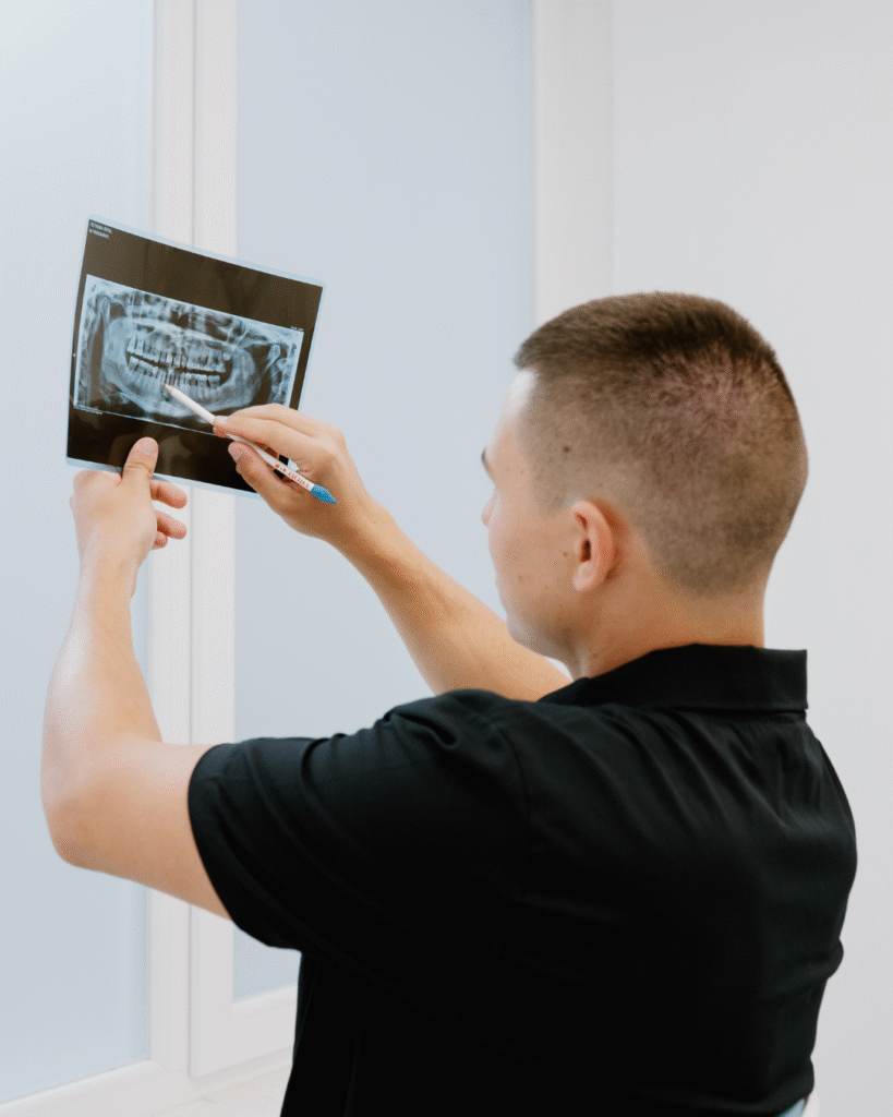 DrNedevski looking at dental photography